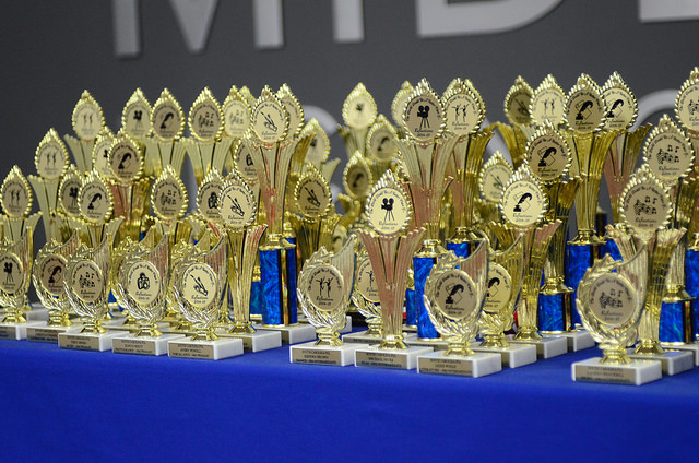 photo of a large group of trophies on a table
